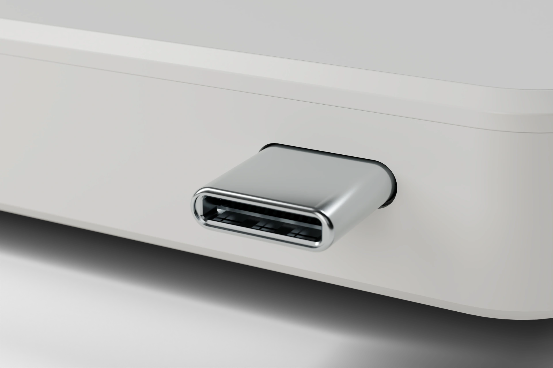 Detail of the R1 polymer enclosure and integrated USB-C connector. Design visualization.